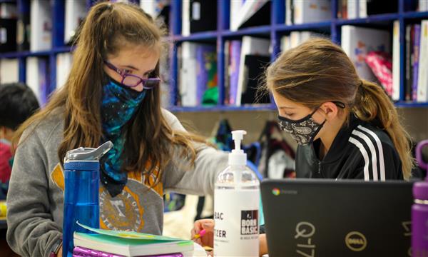 Students work on Escape Room problems